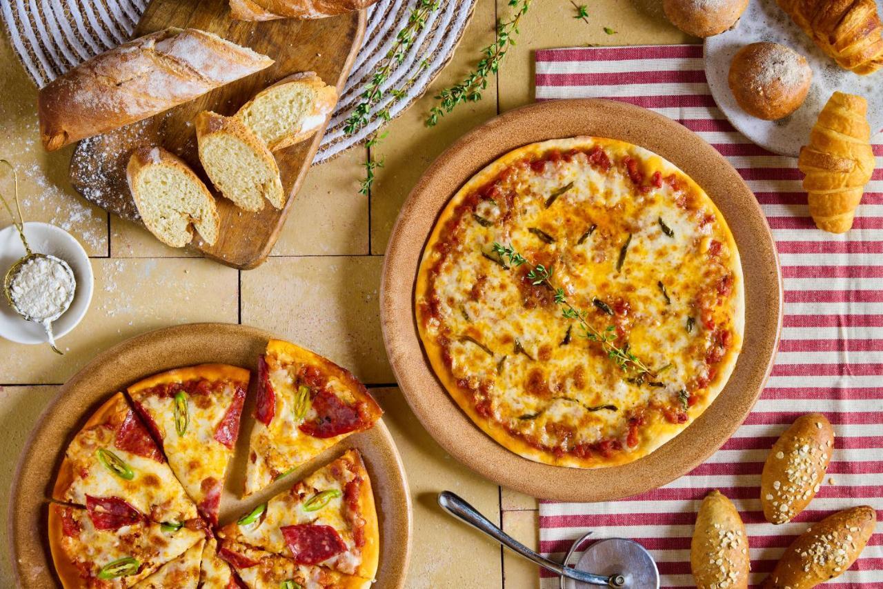 Benben By Dhara Hotels - Adults Only Asvan Dış mekan fotoğraf Pizza